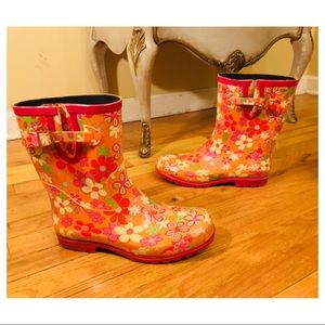 The cutest rainboots feet have ever splashed in!